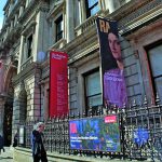 Exterior view with Burlington House banners