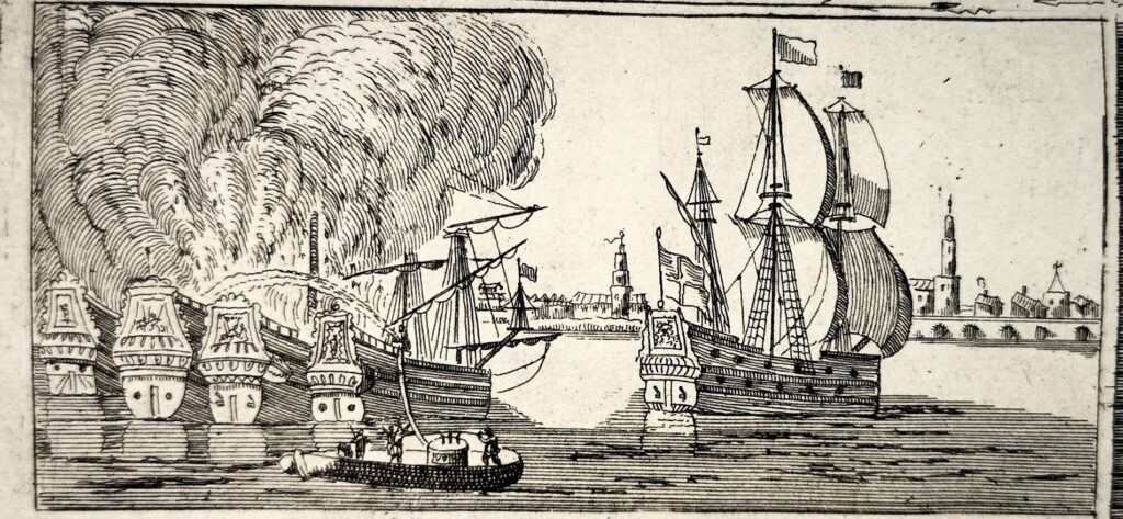 The fire sucking worm being used on ships in a harbour